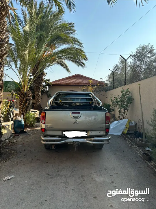 تندر متسبيشي L200 دفع خلفي 4x2 الحالة نظيف و السعر قابل لتفاوض مطور قير نظاف نظاف