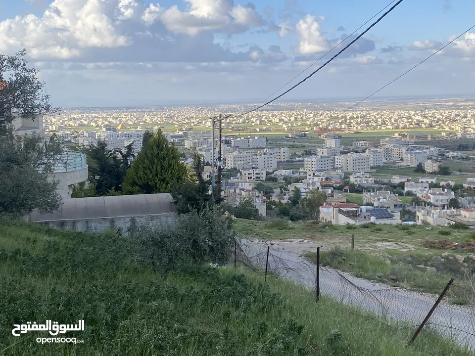 فرصتك الذهبية لبناء بيت العمر او إسكان – أرض سكنية مرتفعة بإطلالة ساحرة في الحصن / حوض الأصبح