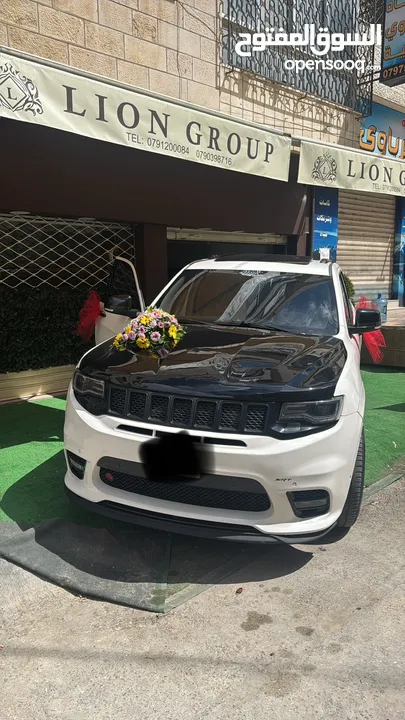 جيب شيروكي ملك العضلات الامريكي SRT8  موديل 2014 لون ابيض للايجار فقط من عند مكتب Lion  Group
