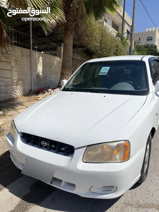هيونداي فيرنا لون ابيضّ مميز موديل 1999
