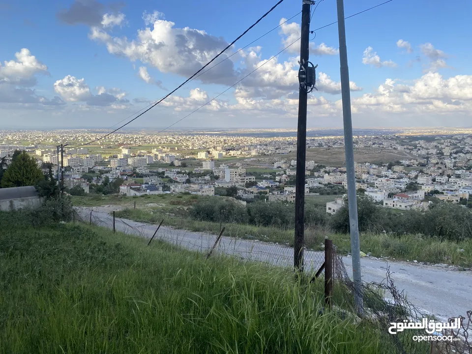 فرصتك الذهبية لبناء بيت العمر او إسكان – أرض سكنية مرتفعة بإطلالة ساحرة في الحصن / حوض الأصبح