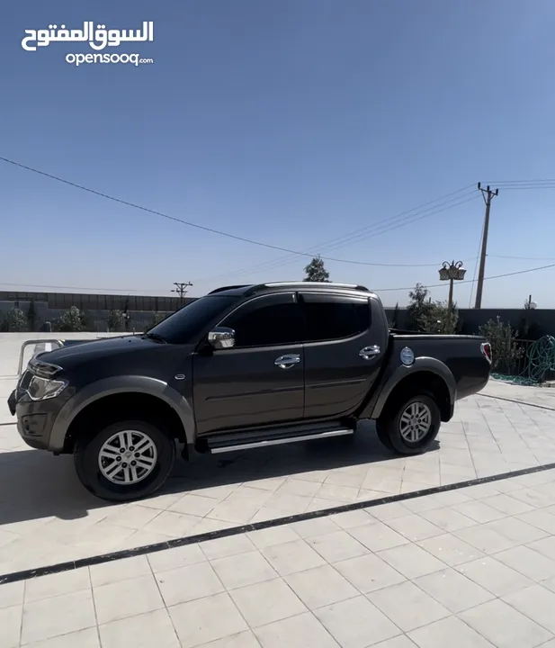 موديل 2015  L200 سبرتيرو مميزة 4 جيد نظيف