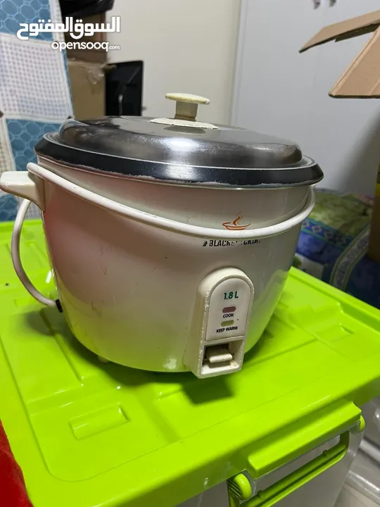 Tv , Rice Cooker and glass and plates