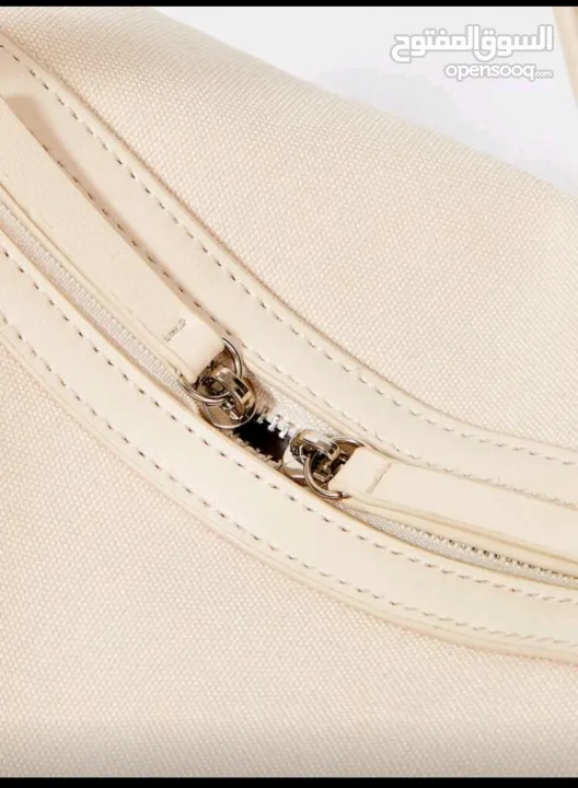 شنطة يد وسط