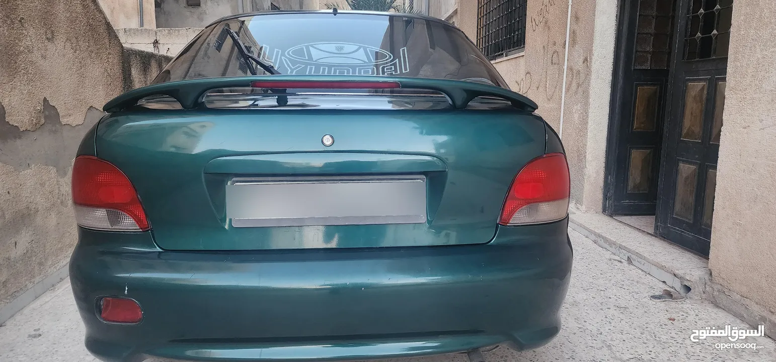 هونداي اكسنت هاتش باك فحص ممتاز موديل 1998عين الباشا حي الأمير علي مقابل شركة الاتصالات اورانج