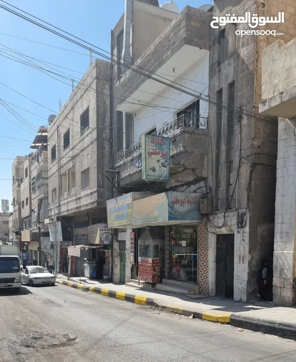 بناية  في موقع حيوي في الزرقاء مؤجرة للبيع بشكل كامل   الرقم المرجعي : 2712