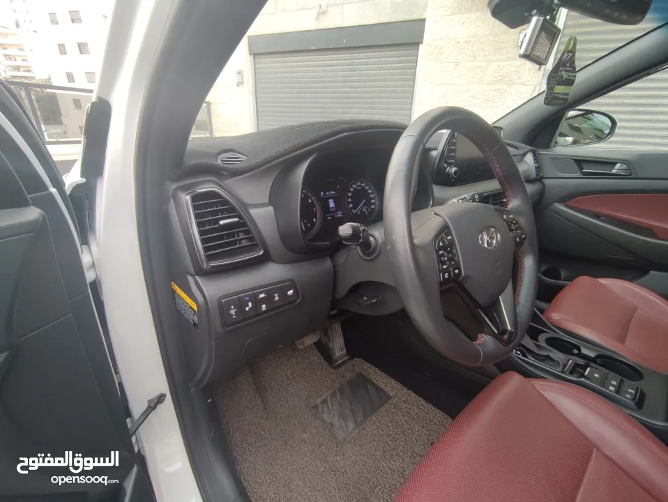 هونداي توسان فل الفل اضافات دهان شركة وعداد أصلي 70000كم فقططط رخصة وتأمين شامل للبيع بسعر مغري