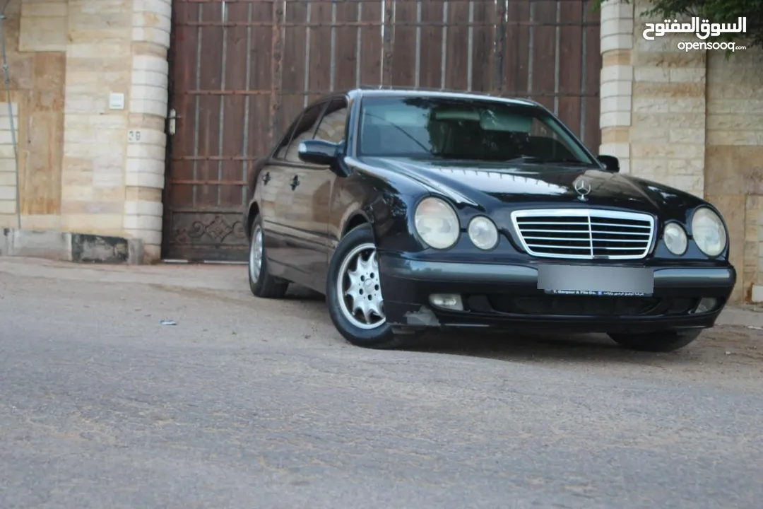 E200. 2002  قرش ونص 2002  رقم الهاتف بالوصف