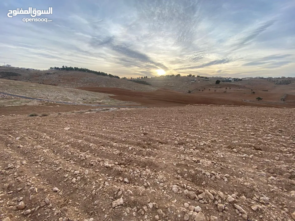 قطعة ارض مميزة في جرش للبيع قريبة من الطريق الرئيسي (اربد - عمان)