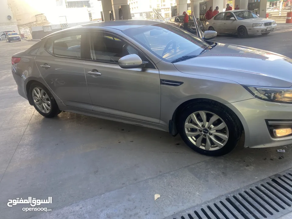 كيا اوبتيما بنزين 2014 بسعر 8900 الف