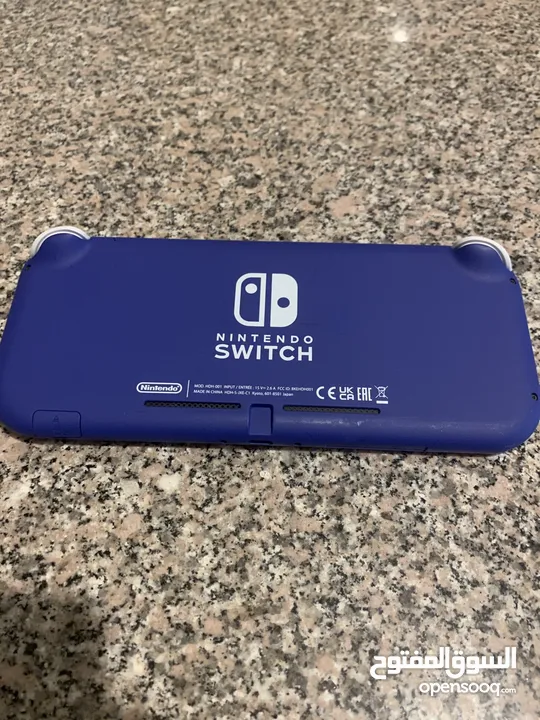 Nintendo switch lite for sale great condition, almost brand new, barely used, no cracks