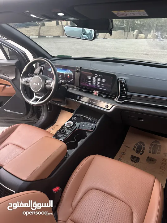 كيا سبورتاج هايبرد 2023 / فل كامل مع بانوراما وفرش مميز غرفه عسليه / عداد قليل / سعررر مميز جداً