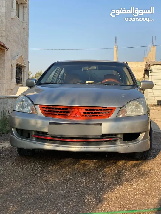 لانسر قير عادي متور 1300 فحص 2 جيد