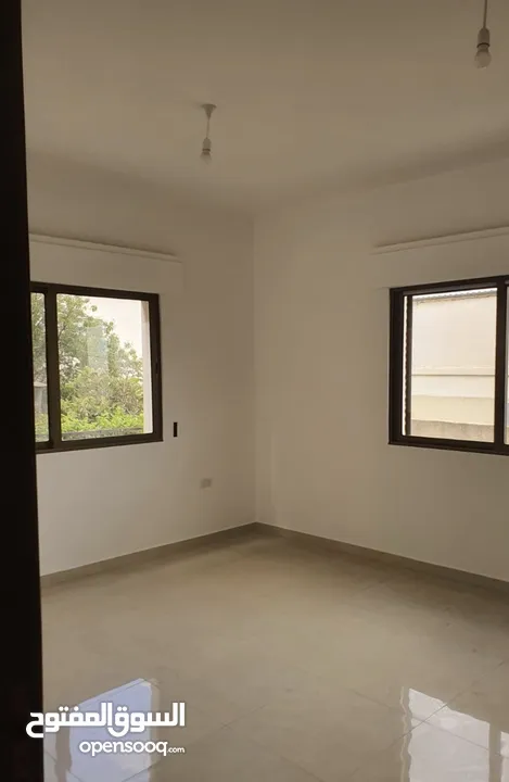 عماره جديده/4 شقق طابقيه للبيع