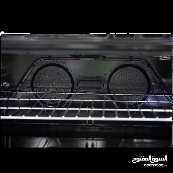 فرن غاز نيوتن 90 سم ستانلس مروحتين لتوزيع الحرارة فرن واسع 130 لتر فل سيفتي عين تيربو مناصب سكب