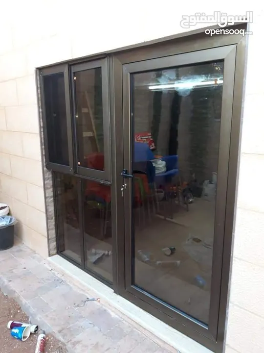 أعمال الألمنيوم شبابيك مقطع فلسطيني وخاص وكيرتن وال وفولدينج وسكوريت وسكاي لايت والكبوند والصيانة