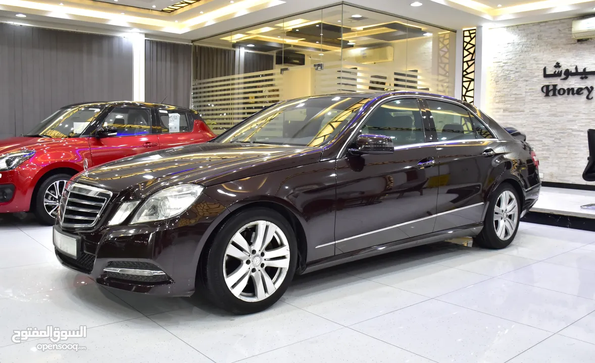 Mercedes Benz E300 ( 2011 Model ) in Burgundy Color GCC Specs