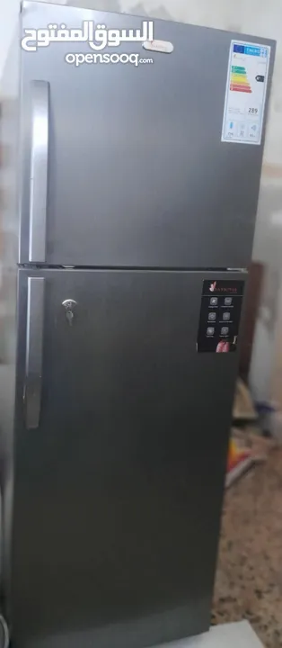 ثلاجه ناشونال و غساله لون سلفر بحال الجديد استخدام بسيط للبيع