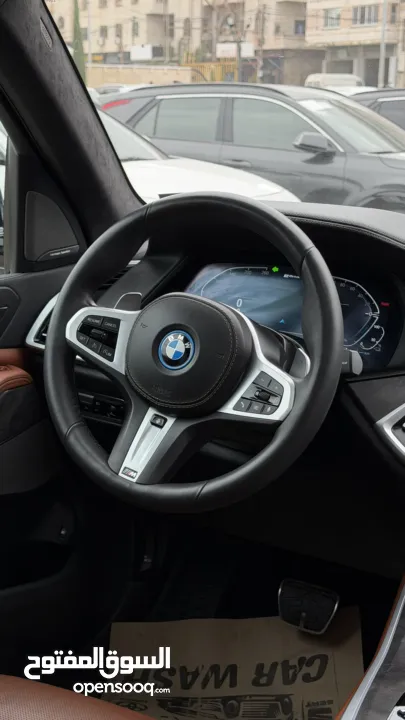 BMW X5 ترخيص 2022 ص محرك 3000 هايبرد plug in/يقطع على الشحنه 80 كيلو متر 399 حصان