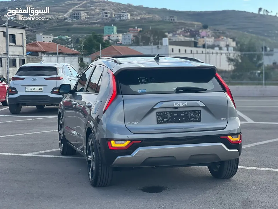 كايا نيرو هايبرد (بنزين+كهرباء ) فل الفل فتحة سقف لون مميز اضافات مميزة /2022 جناح اسود