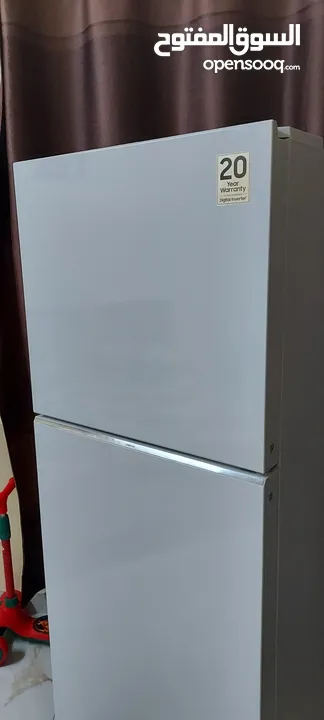 Almost new Samsung refrigerator, used for only 5 months, under one year warranty. Location: Al Ghubr