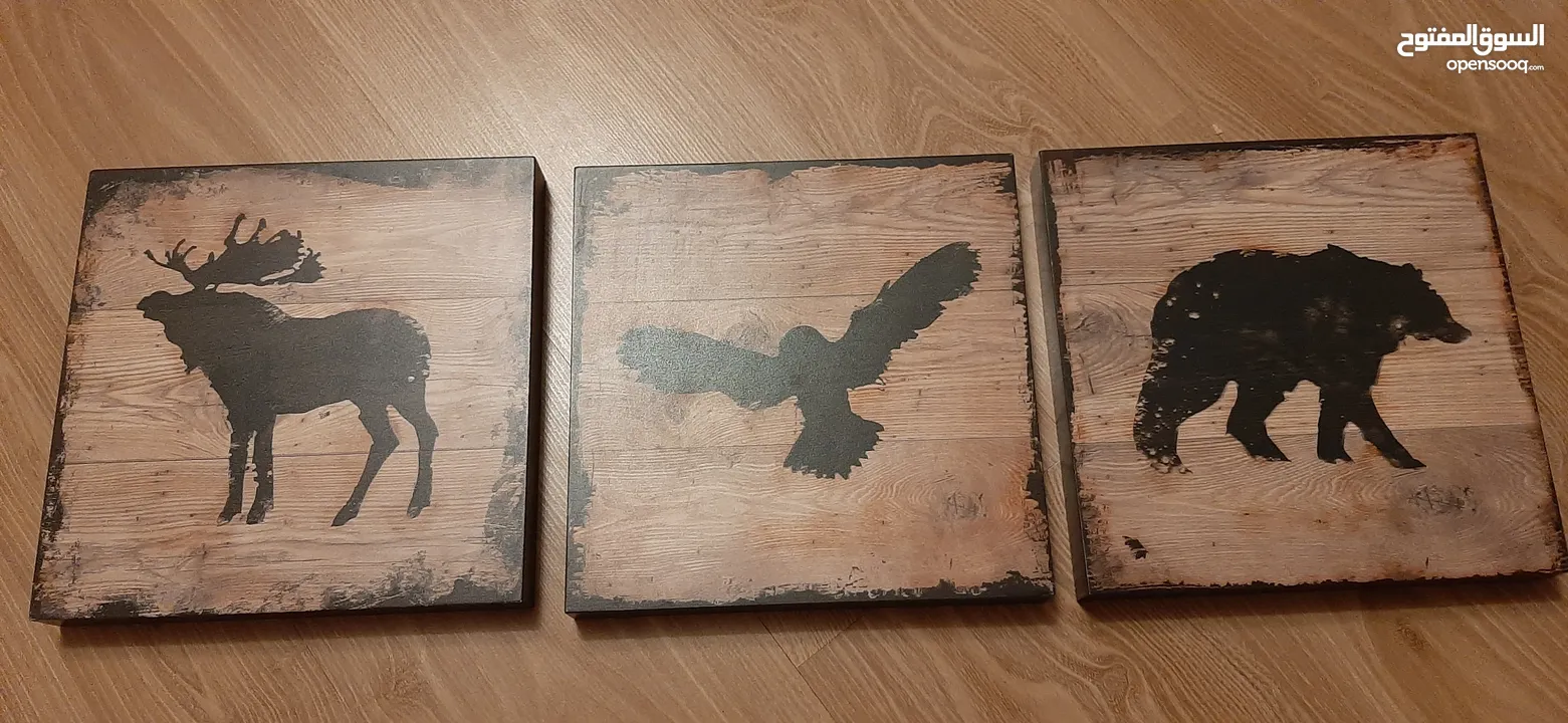 A set of three wooden pictures - لوحات خشبية