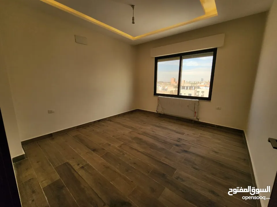 شقة طابقية للبيع في حي الصحابة - ref : 14579