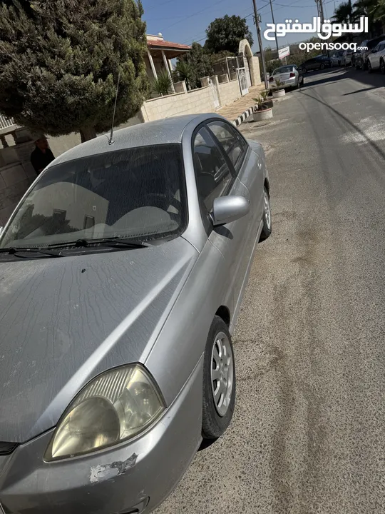 كيا ريو بحالة ممتازة  جير عادي 2004
