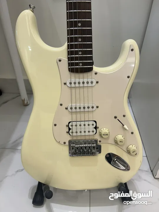 Squire fender electric guitar HSS,includes 2 capos,stand,pink carry bag,Yamaha amplifier and cable