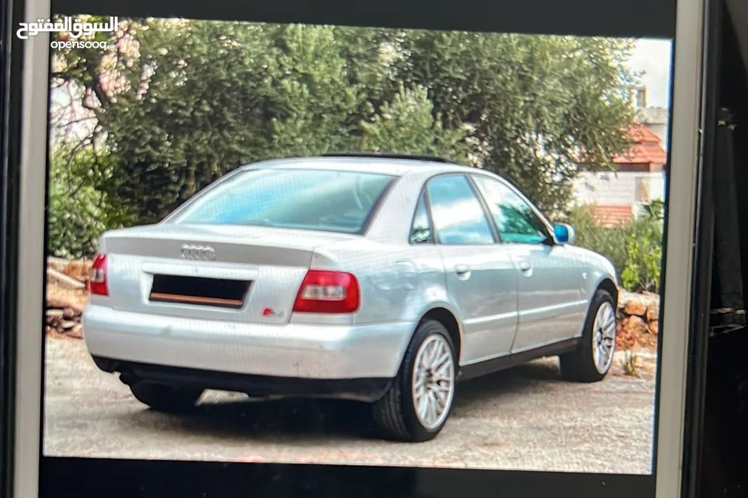 اودي A4 موديل 2000   مطور 1800  فتحة سقف  جنط مغنسيوم  مسجل شاشة  كمرة خلفية جير مطور 100/100