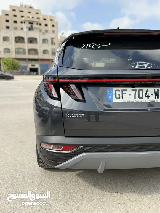 هونداي توسان ترخيص 2022 محرك 1600 هايبرد plug in/يقطع على الشحنه 65 كيلو متر