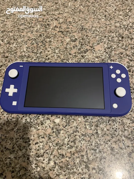 Nintendo switch lite for sale great condition, almost brand new, barely used, no cracks