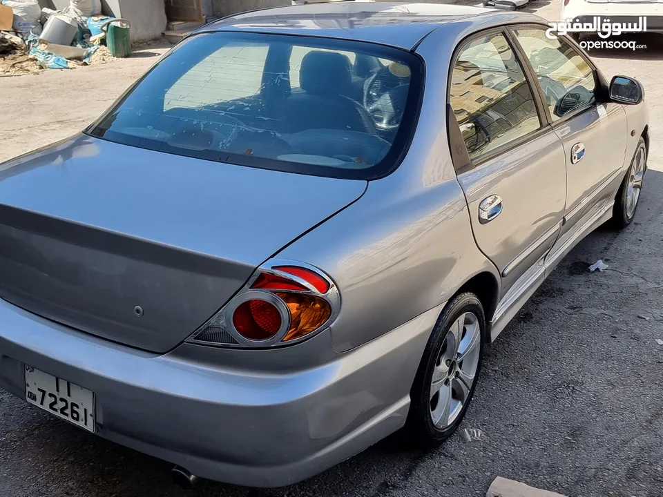 كيا سبيكترا 2001 بسعر 2400 جير عادي سياره نظيفه جدا  kia spectra 2001