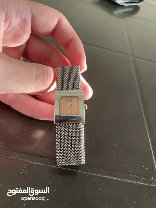 Metal Tissot watch