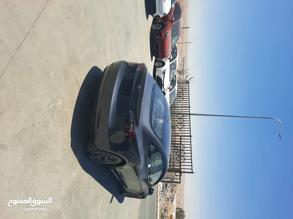 تيسلا موديل 3 موديل 2023 لون فيراني داخل ابيض عداد قليل بسعر مناسب