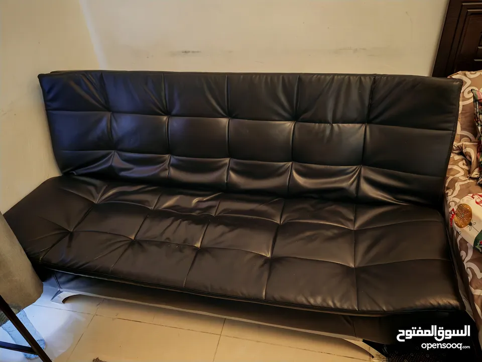 Leather sofa bed , looks new ,just used for 6 months , high quality and it is modern style