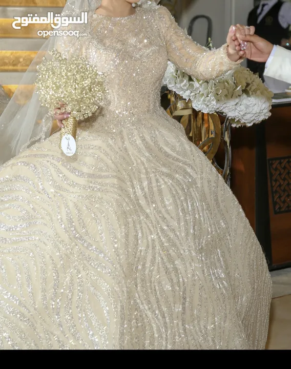 بدلة عرس لبسة وحدة محجبة