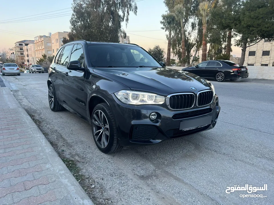 بي ام دبليو X5 بلج ان وارد وكاله عمان  فل كامل فحص كامل بحاله الوكاله دهان الشركه