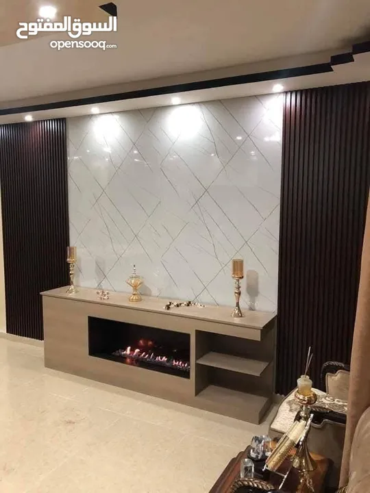 فاير بليس ورق جدران والشيبورد وبانوهات وجبسن بورد شلالات بارجولا نوافير بديل الرخام وبديل الخشب والق