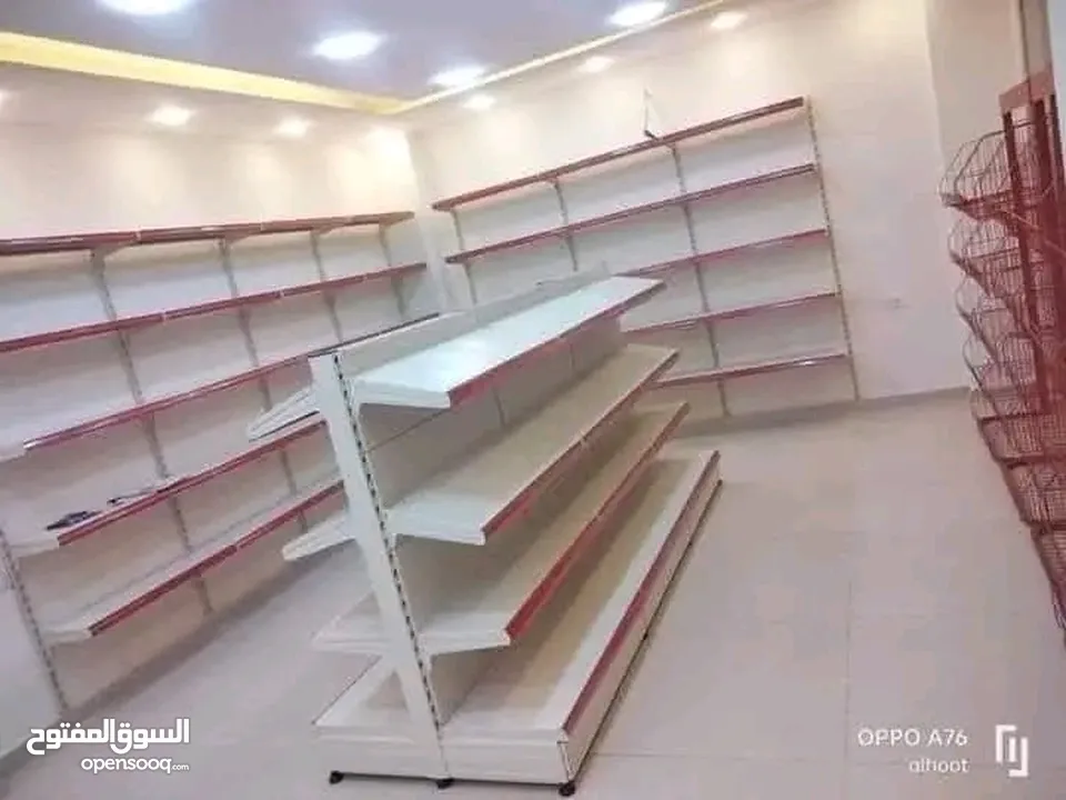 رفوف حائط + وسطي بحال لوكاله للبيع للجادين فقط الاتصال