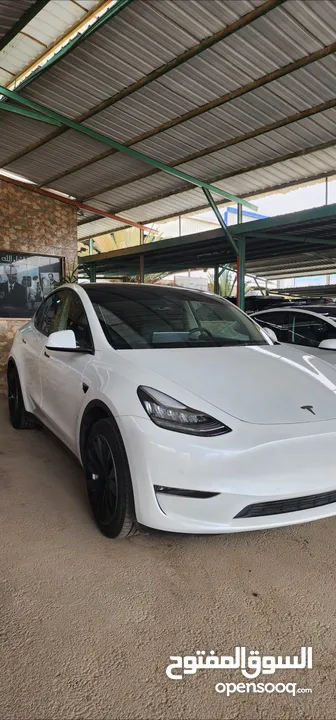 TESLA MODEL Y 2022 LONG RANGE   DUAL MOTOR  فحص اوتوسكور B+ بحاله الوكالة