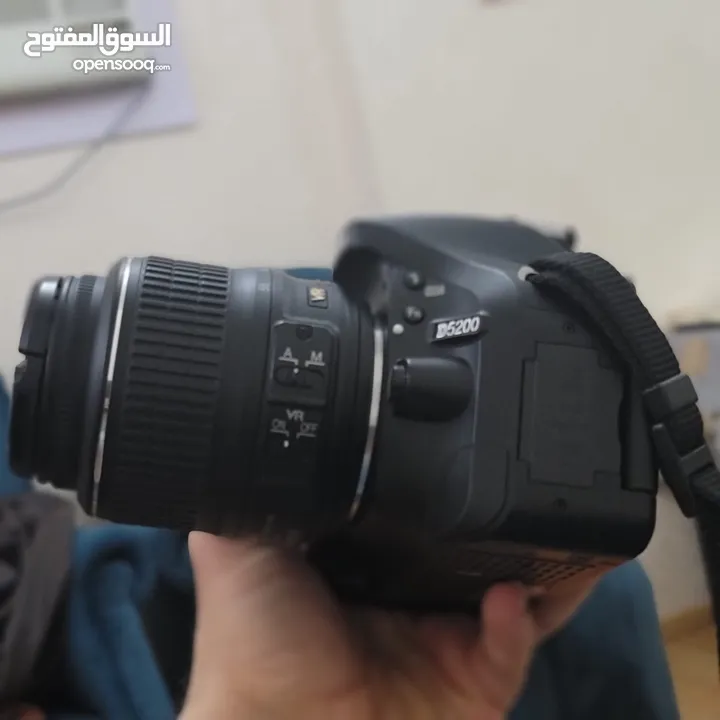 كاميرا نيكون D5200 مع عدستين(18-55)mm  و (55-200)mm