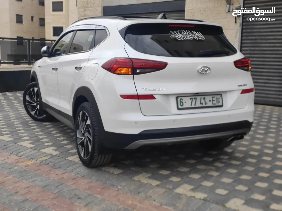 هونداي توسان فل الفل اضافات دهان شركة وعداد أصلي 70000كم فقططط رخصة وتأمين شامل للبيع بسعر مغري