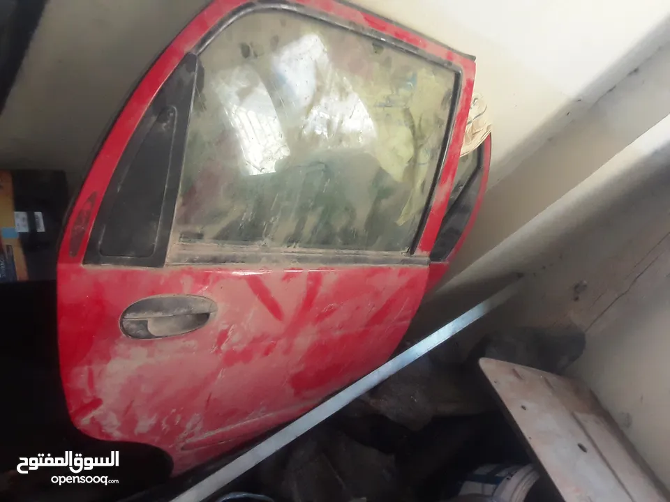 اربع ابواب وغطا امامي وغطا خلفي لشيري QQ 2006