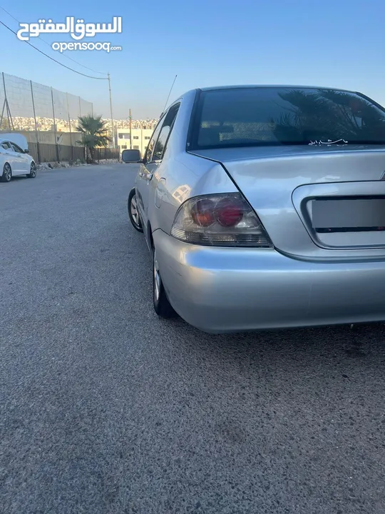متسوبيشي لانسر 2004محدثه بالكامل 2013