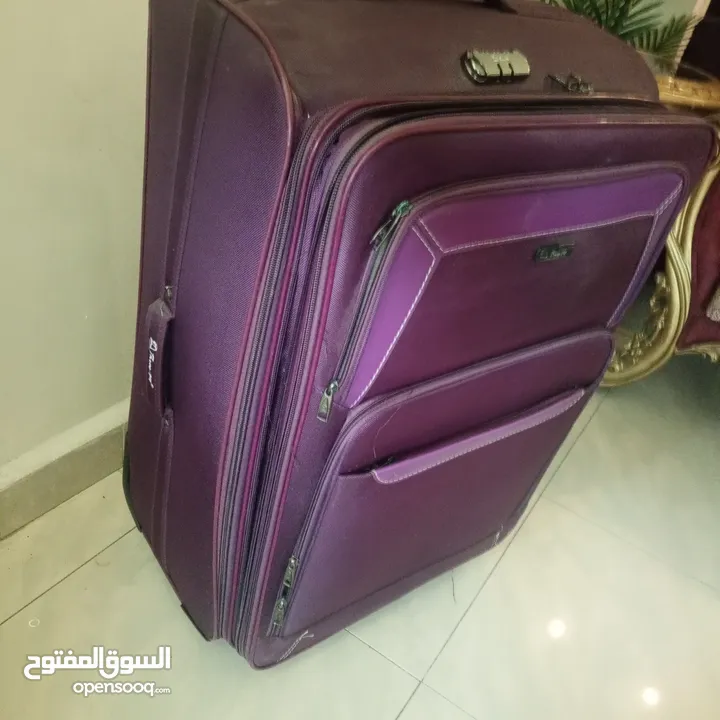 شنتة سفر جر لون بنفسجي غامق حجم كبير