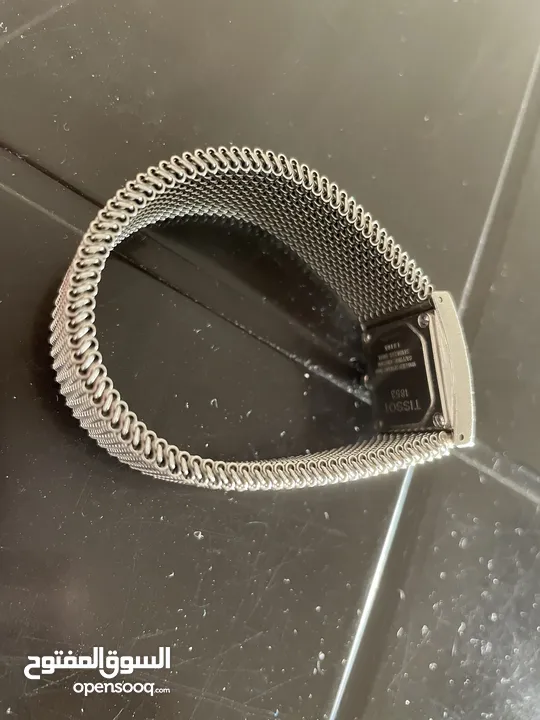 Metal Tissot watch