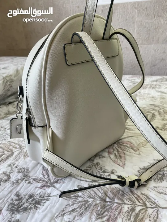 GUESS whit ,small bag with silver zippers