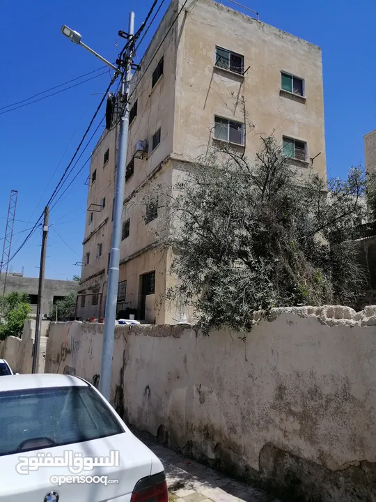 عماره مع ارض للبيع تصلح للاستثمار او اسكان