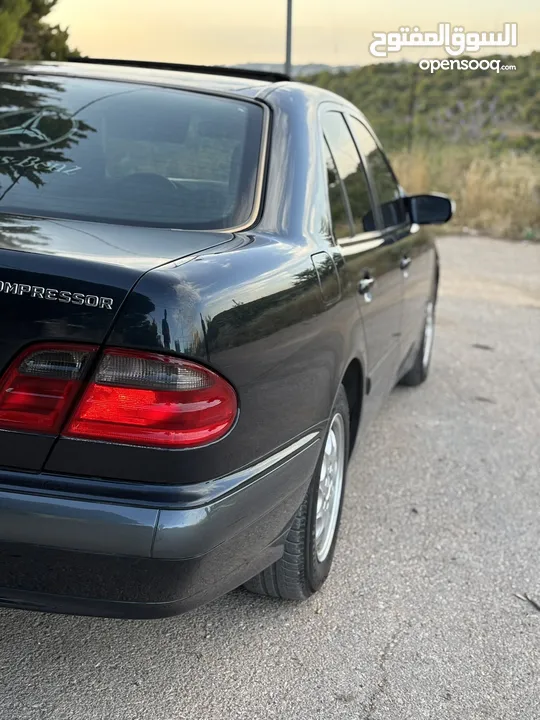 E200. 2002  قرش ونص 2002  رقم الهاتف بالوصف